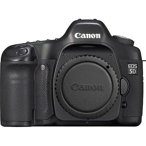 A black Canon EOS 5D digital camera body with no lens attached, showing the Canon logo and EOS 5D branding on the front.