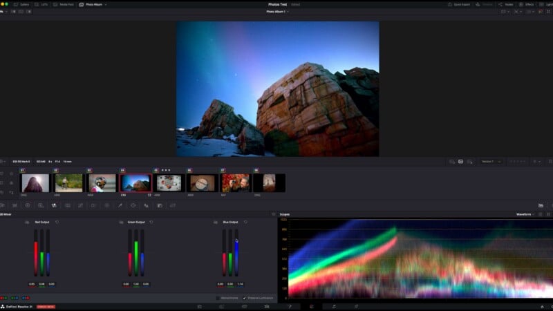 A computer screen shows video editing software with a rocky landscape image. Color grading tools, waveform monitor, and color wheels are visible below the main preview window. Thumbnails of other images are shown in a strip.