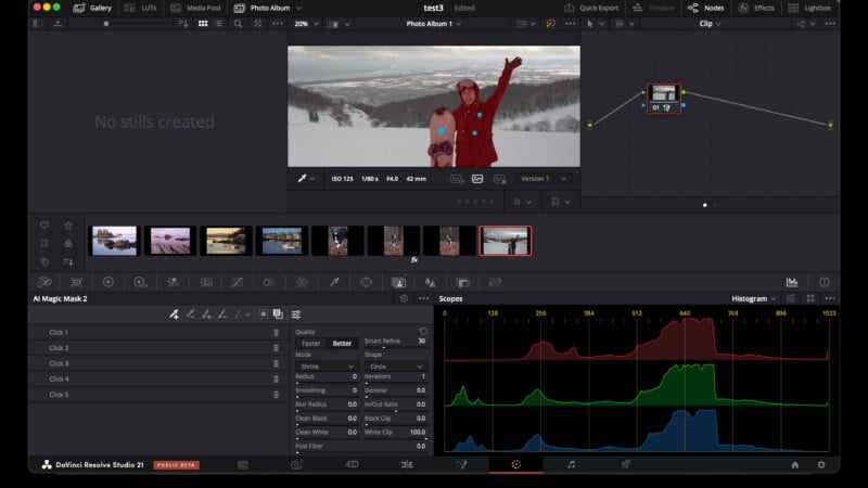Screenshot of DaVinci Resolve editing software showing a color grading workspace. A video clip of two people in red standing in snow is displayed, with color correction tools and histogram visible on the screen.
