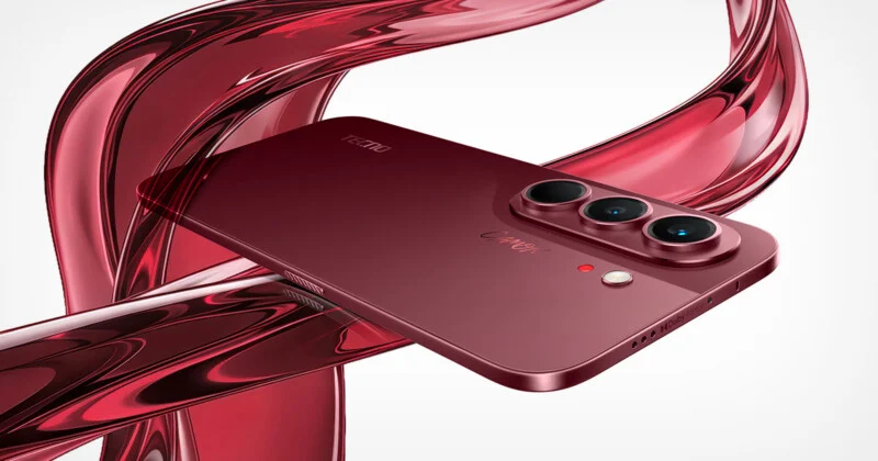 A dark red smartphone with a triple-lens camera system floats against a background of swirling, translucent red ribbons.