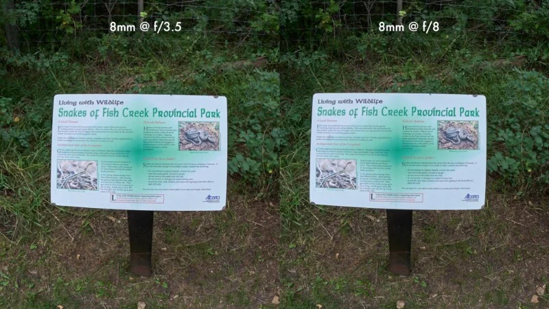 A side-by-side comparison of a sign titled "Living with Wildlife: Snakes of Fish Creek Provincial Park" at f/3.5 and f/8.