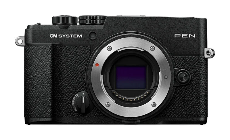A front-facing black OM SYSTEM PEN mirrorless camera body with a silver lens mount and a dedicated color/mono switch.