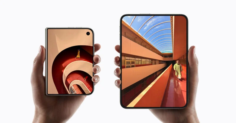 Two hands hold a foldable smartphone in its closed, compact state on the left and its fully unfolded, tablet-like state on the right.